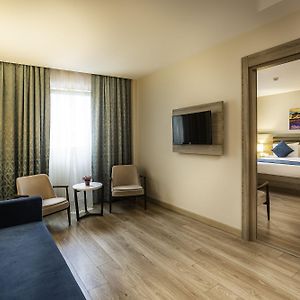 Suite met een Queen Size Bed