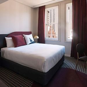 Kamer met een Queen Size Bed