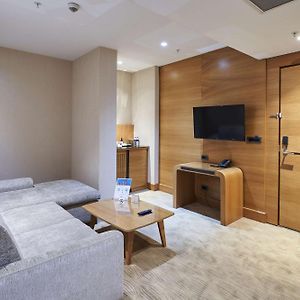 Suite met een Slaapkamer en een King Size Bed