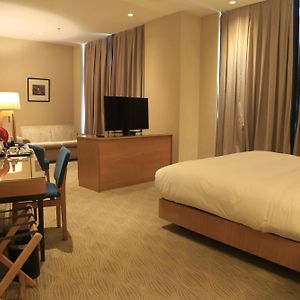 Kamer met een Queen Size Bed