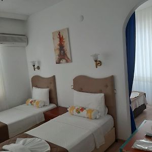 Üç Kişilik Oda