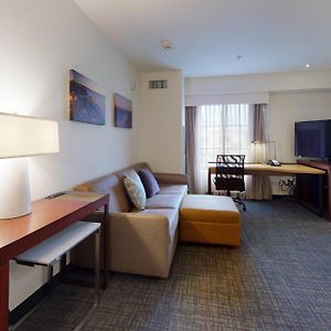 Suite met een Slaapkamer en een King Size Bed