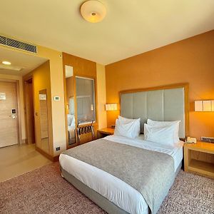 Kamer met een Queen Size Bed