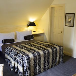 Kamer met een Queen Size Bed