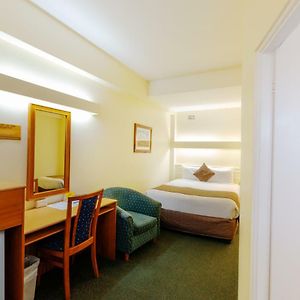 Kamer met een Queen Size Bed